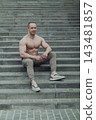 A CrossFit man poses for the camera on a sports 143481857