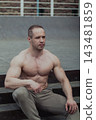 A CrossFit man poses for the camera on a sports 143481859