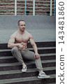 A CrossFit man poses for the camera on a sports 143481860