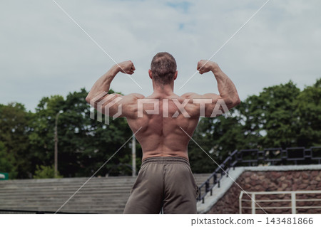 A CrossFit man poses for the camera on a sports 143481866