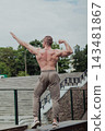 A CrossFit man poses for the camera on a sports 143481867