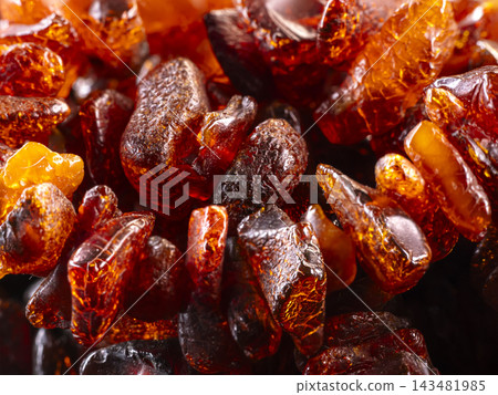 Closeup of amber necklace stones Closeup of amber necklace stones 143481985