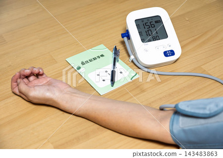 Measuring blood pressure; image of high blood pressure Measuring blood pressure; image of high blood pressure 143483863