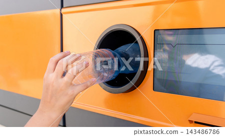 Bottle return station accepting recyclable plastic container. 143486786