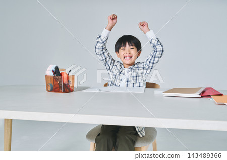Boy studying Boy studying 143489366