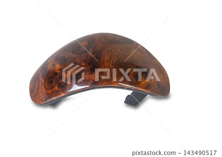 Wooden trim for handle of shifting automatic gears of the car. Decorative details on a black background Wooden trim for handle of shifting automatic gears of the car. Decorative details on a black background 143490517