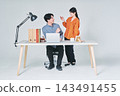 Men and women working at desks 143491455