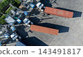 Aerial view EV charging and semi truck electric vehicle, Electric vehicle semi truck trailer charging station for charge EV battery, EV charger semi truck trailer station. 143491817