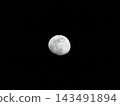 moon floating in the night sky 143491894