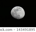 moon floating in the night sky 143491895