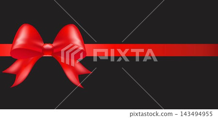 Shiny red color satin ribbon on black background Shiny red color satin ribbon on black background 143494955