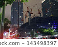 Night view of the area around Tokyo Station, construction site cranes 143498397