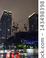 Night view of the area around Tokyo Station, construction site cranes 143498398