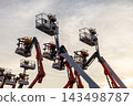 Articulate boom lift with blue sky background, Aerial platform lift telescopic boom lift hydraulic boom lift, Mobile construction crane, Construction boom lifts 143498787