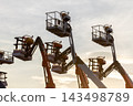 Articulate boom lift with blue sky background, Aerial platform lift telescopic boom lift hydraulic boom lift, Mobile construction crane, Construction boom lifts 143498789