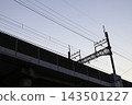 Overhead line poles and power lines in Musashi-Kosugi at dusk 143501227
