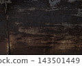 Dark rusty metal plate texture with rough weathered iron surface, corroded industrial steel background. Vintage grunge abstract pattern for design, heavy corrosion and decay details on old dark sheet. 143501449