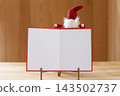 Tomte and message card, Christmas season theme, simple wood grain background 143502737