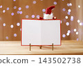Tomte and message card, Christmas season image, sparkling illumination background. 143502738