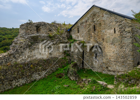 Ujarma Fortress, ancient medieval fortress city in eastern Georgia, dramatically perched on a rocky hill overlooking the Iori River Ujarma Fortress, ancient medieval fortress city in eastern Georgia, dramatically perched on a rocky hill overlooking the Iori River 143502859
