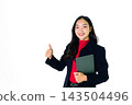 Young Asian Businesswoman Giving Thumbs Up While Holding Laptop on White Background 143504496