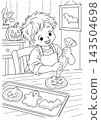 Halloween Coloring Page of a Boy Decorating a Pumpkin Cookie with Icing 143504698