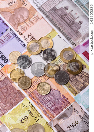 India paper money, rupee banknotes and coins as currency for exchange or travel. Indian money 143505826