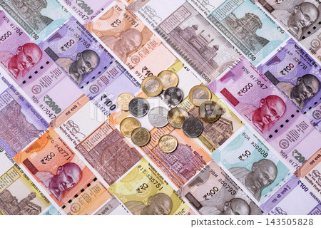 India paper money, rupee banknotes and coins as currency for exchange or travel. Indian money India paper money, rupee banknotes and coins as currency for exchange or travel. Indian money 143505828