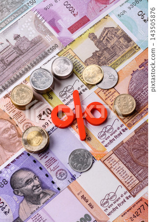The percentage sign on cash as a concept for inflation or tax liabilities. The percentage sign The percentage sign on cash as a concept for inflation or tax liabilities. The percentage sign 143505876