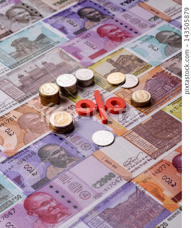 The percentage sign on cash as a concept for inflation or tax liabilities. The percentage sign The percentage sign on cash as a concept for inflation or tax liabilities. The percentage sign 143505879
