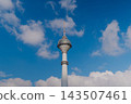 Endem TV Tower against the blue sky with white clouds 143507461