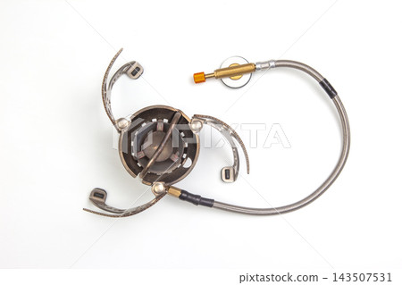 Basic camping stove on white background ready for outdoor cooking 143507531