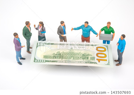 Miniature people discussing around a large one-hundred-dollar bill on a white background 143507693