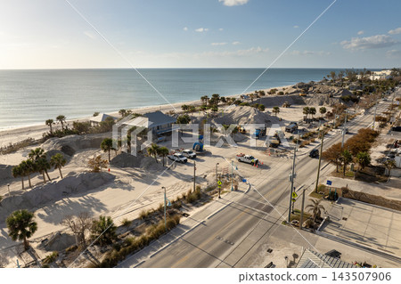 Hurricane aftermath cleanup. Piles of sand at sand recipient site on ocean shore in Florida Hurricane aftermath cleanup. Piles of sand at sand recipient site on ocean shore in Florida 143507906