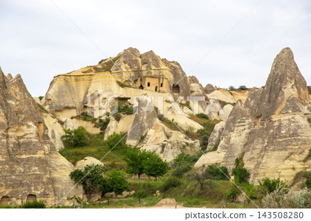 Exploring unique rock formations and cave dwellings in Turkey's Cappadocia region Exploring unique rock formations and cave dwellings in Turkey's Cappadocia region 143508280