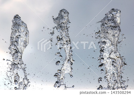 Water splashes from fountain at a public park during afternoon Water splashes from fountain at a public park during afternoon 143508294