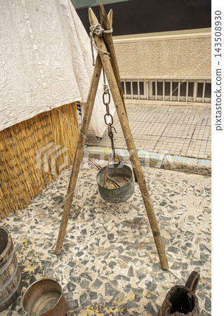 Traditional Wooden Cooking Tripod with Hanging Antique Cauldron Outdoors Traditional Wooden Cooking Tripod with Hanging Antique Cauldron Outdoors 143508930