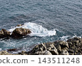 White Sea Foam Around Rocks on Mediterranean Shore 143511248