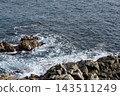 White Sea Foam Around Rocks on Mediterranean Shore 143511249