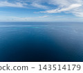 The tranquil expanse of deep blue sea stretches toward the horizon under a soft sky. Bohol, Philippines 143514179