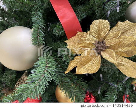 Christmas tree with red ribbon Christmas tree with red ribbon 143514439