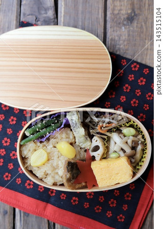 Chestnut rice bento box, a Japanese-style bento box featuring the flavors of autumn. Chestnut rice bento box, a Japanese-style bento box featuring the flavors of autumn. 143515104