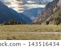 Scenic landscape view of the Chulyshman Valley surrounded by majestic mountain ridges 143516434
