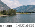 Scenic Chulyshman River Valley view with green trees and high rocky mountains 143516435