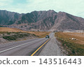 Scenic highway Chuysky Trakt running through mountainous landscape in Altai 143516443