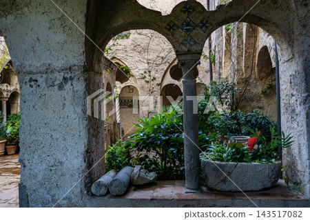 Villa Cimbrone, Ravello, Campania, Italy. Ancient tower and walls completely covered with greenery. 143517082