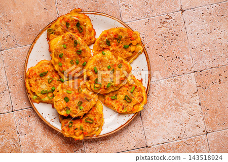 Fried Korean pancakes (jeon) with tuna and vegetables Fried Korean pancakes (jeon) with tuna and vegetables 143518924