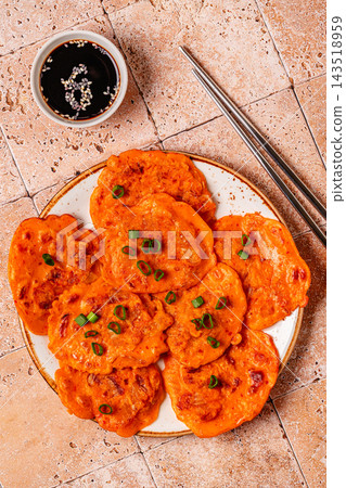 Freshly cooked savory korean pancakes kimchi jeon. Freshly cooked savory korean pancakes kimchi jeon. 143518959