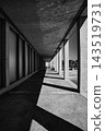 Corridors and geometric spaces of modern architecture interwoven with light and shadow. 143519731