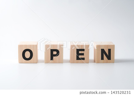 The letters "OPEN" on a wooden block The letters "OPEN" on a wooden block 143520231